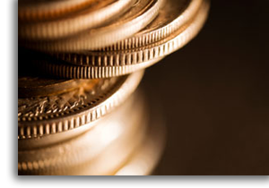 A stacked pile of gold coins.